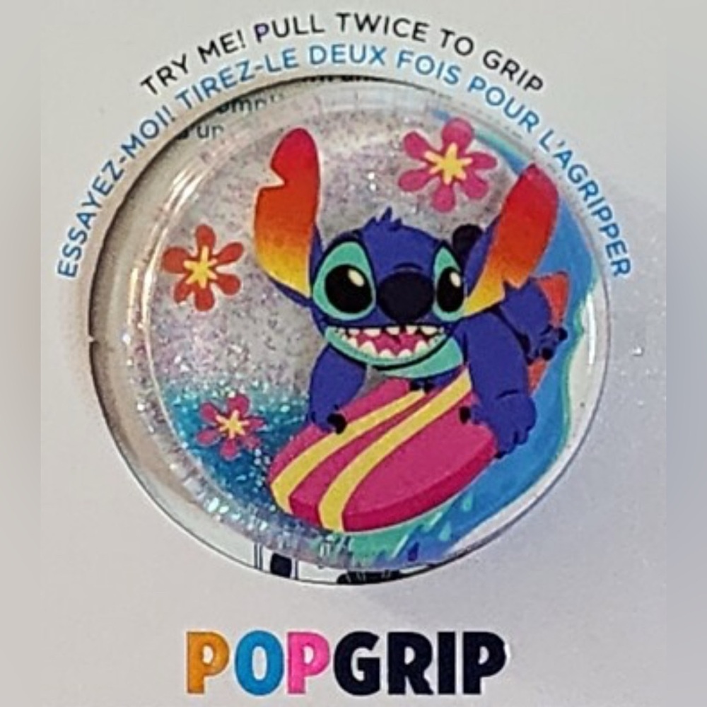 NIB! RARE STITCH GLITTERY SNOWGLOBE POPSOCKET!  
Considered Collectible. Mint!